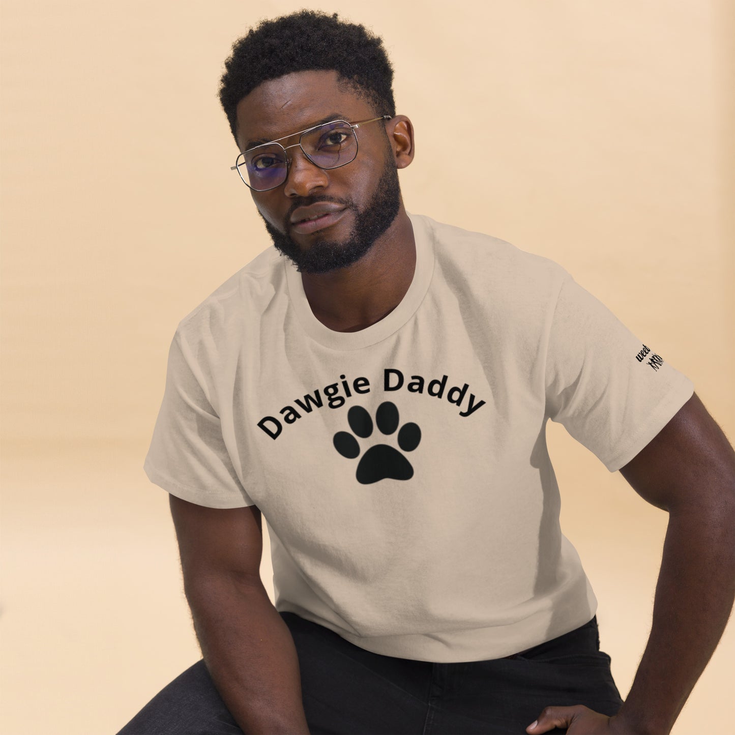 Unisex Classic Tee - Premium Cotton Blend with Classic Fit in Sand - Comfortable Regular Fit with Short Sleeves - Perfect for Dog Walks, Pet Parenting and Casual Wear featuring the words Dawgie Daddy and a Paw Print - wee b00gie store