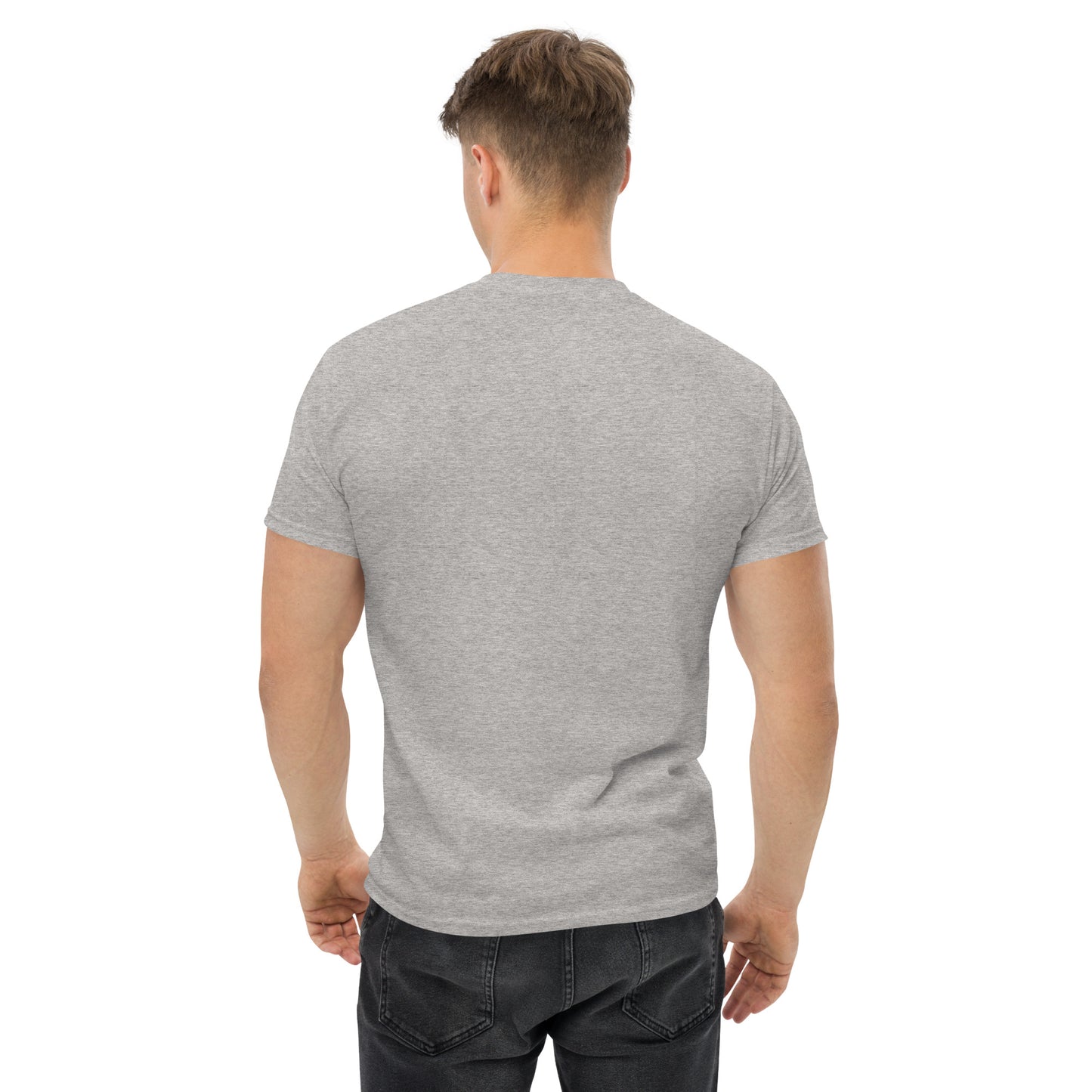 Unisex t-shirt with 'Mountain Man Moves' slogan, styled for outdoor adventures and dance challenges – set against a bold, mountainous backdrop.