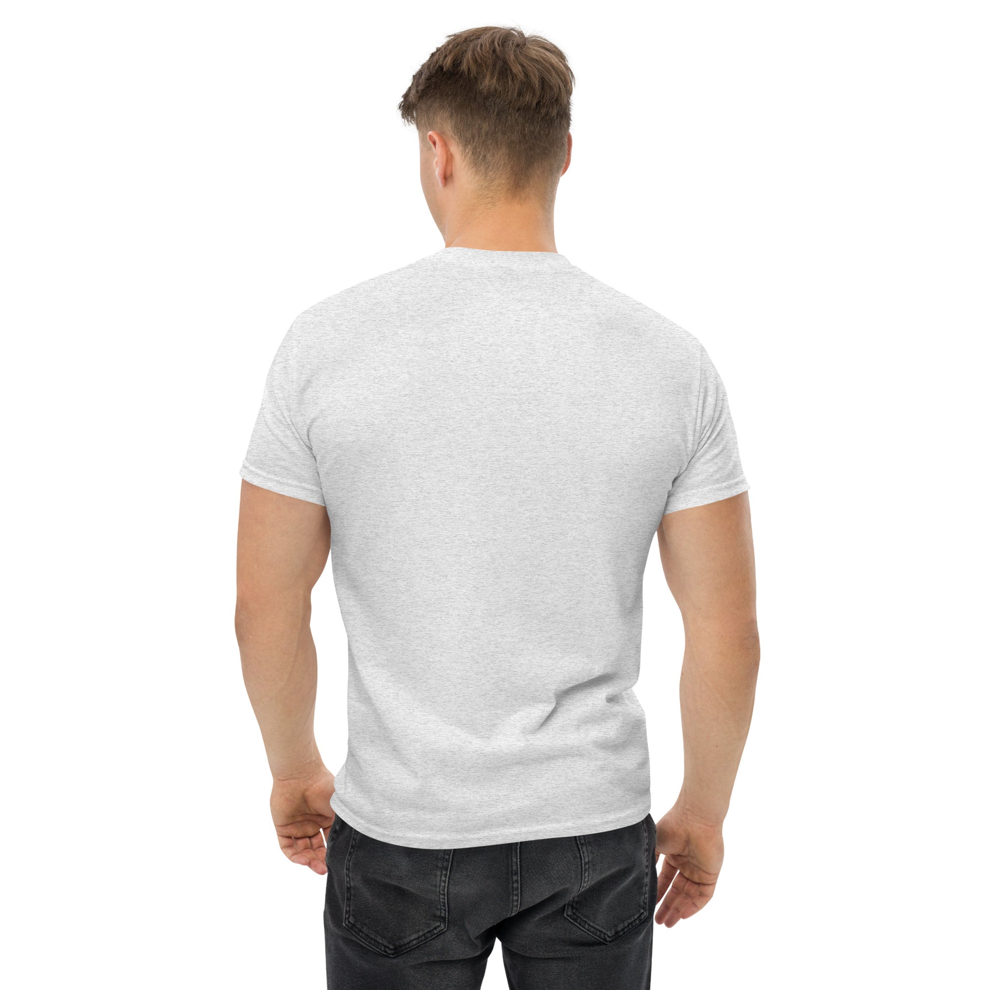 Unisex t-shirt with 'Mountain Man Moves' slogan, styled for outdoor adventures and dance challenges – set against a bold, mountainous backdrop.