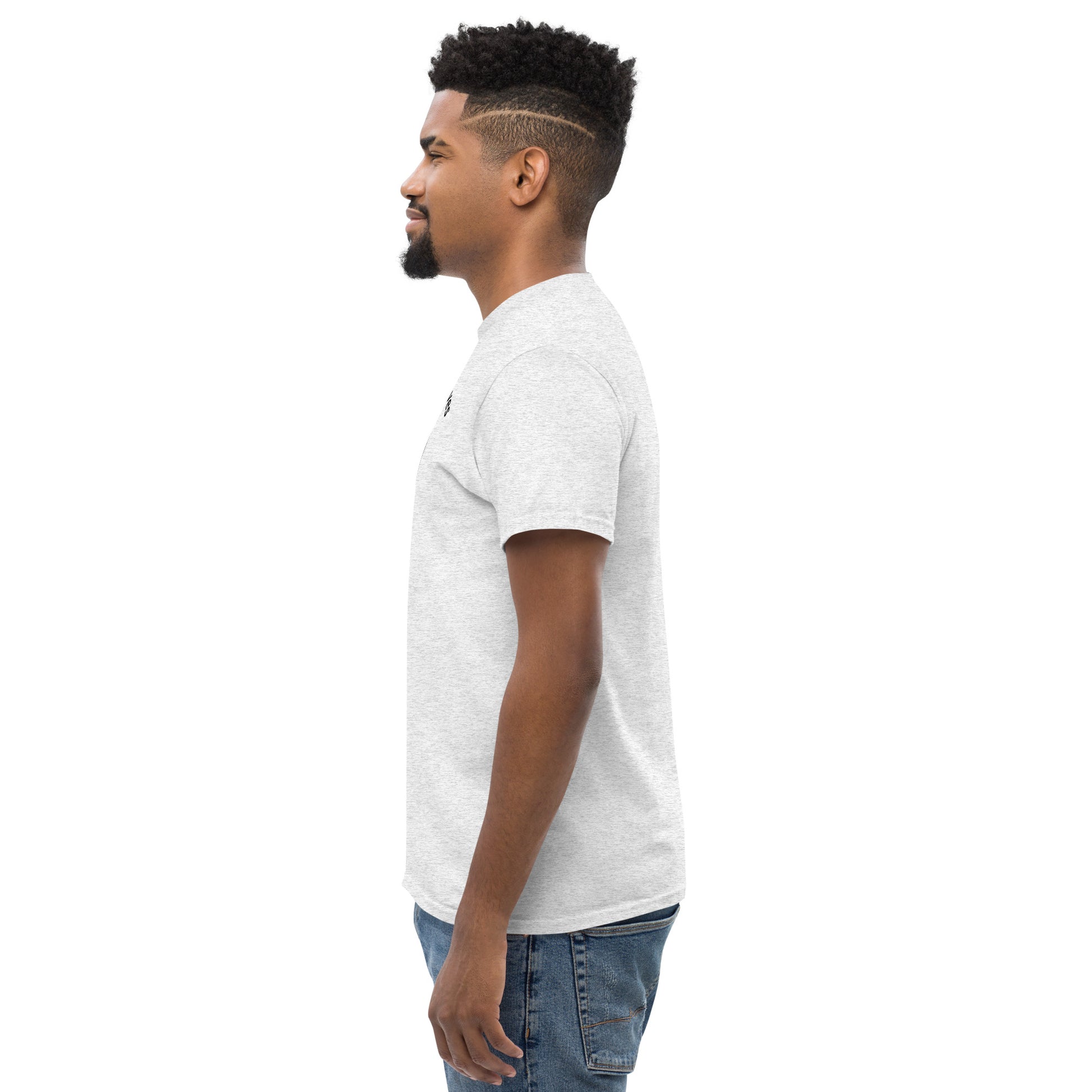 Unisex t-shirt with 'Mountain Man Moves' slogan, styled for outdoor adventures and dance challenges – set against a bold, mountainous backdrop.