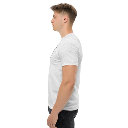 Unisex t-shirt with 'Mountain Man Moves' slogan, styled for outdoor adventures and dance challenges – set against a bold, mountainous backdrop.