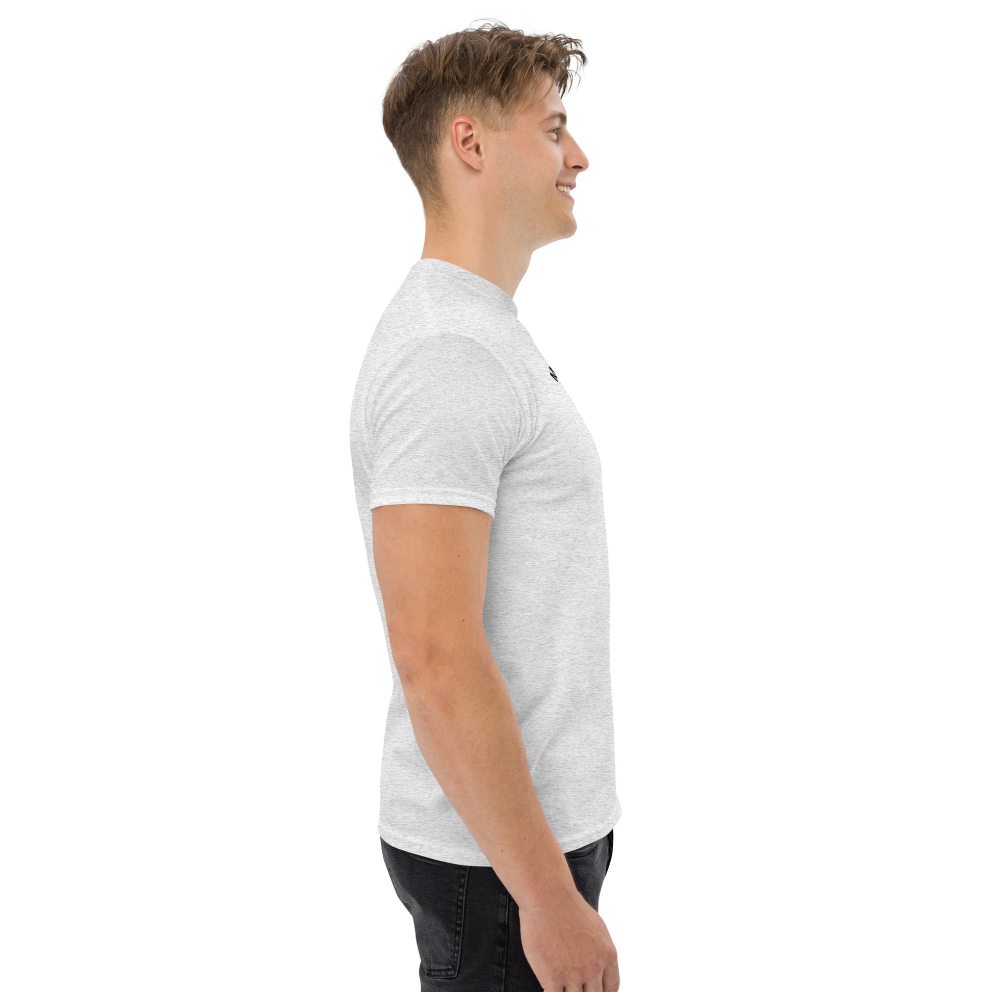 Unisex t-shirt with 'Mountain Man Moves' slogan, styled for outdoor adventures and dance challenges – set against a bold, mountainous backdrop.