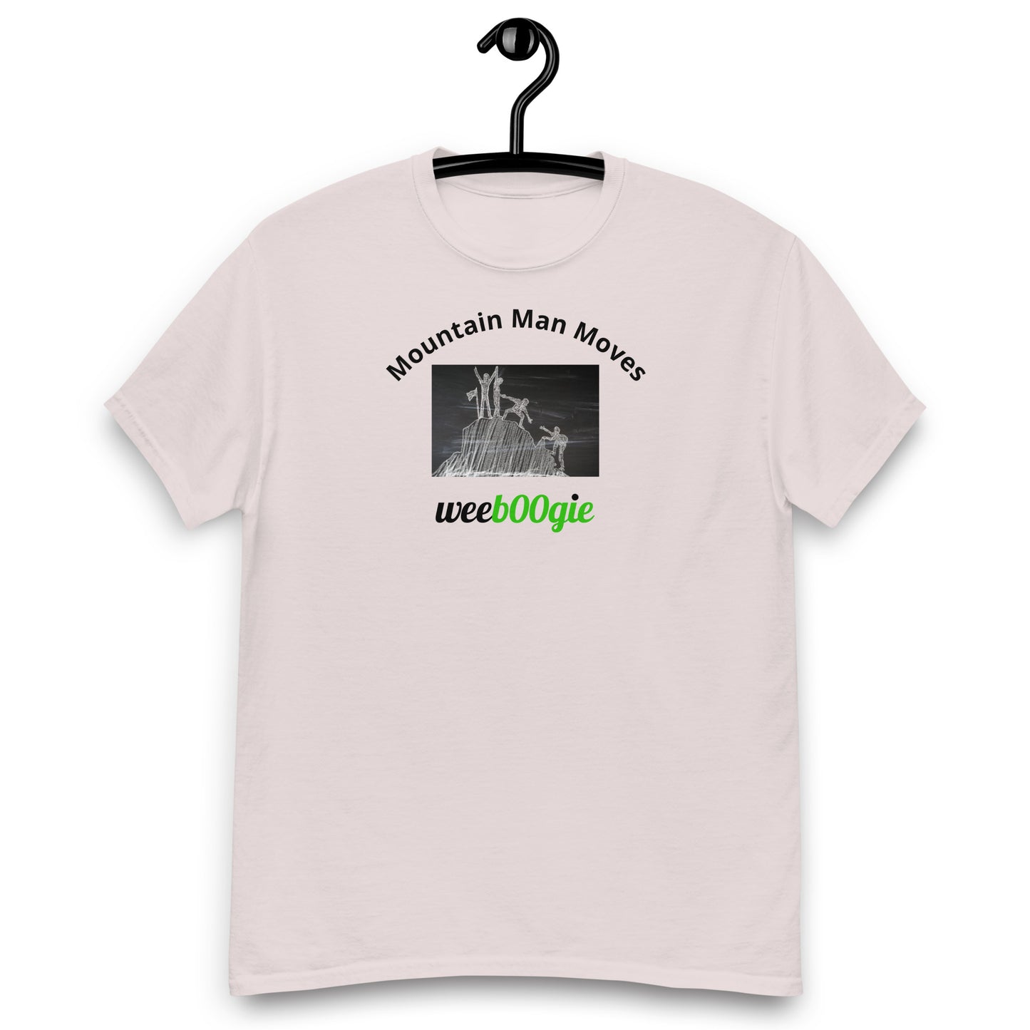 Unisex t-shirt with 'Mountain Man Moves' slogan, styled for outdoor adventures and dance challenges – set against a bold, mountainous backdrop.