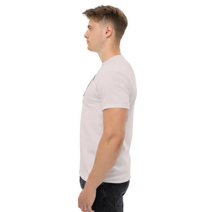 Unisex t-shirt with 'Mountain Man Moves' slogan, styled for outdoor adventures and dance challenges – set against a bold, mountainous backdrop.