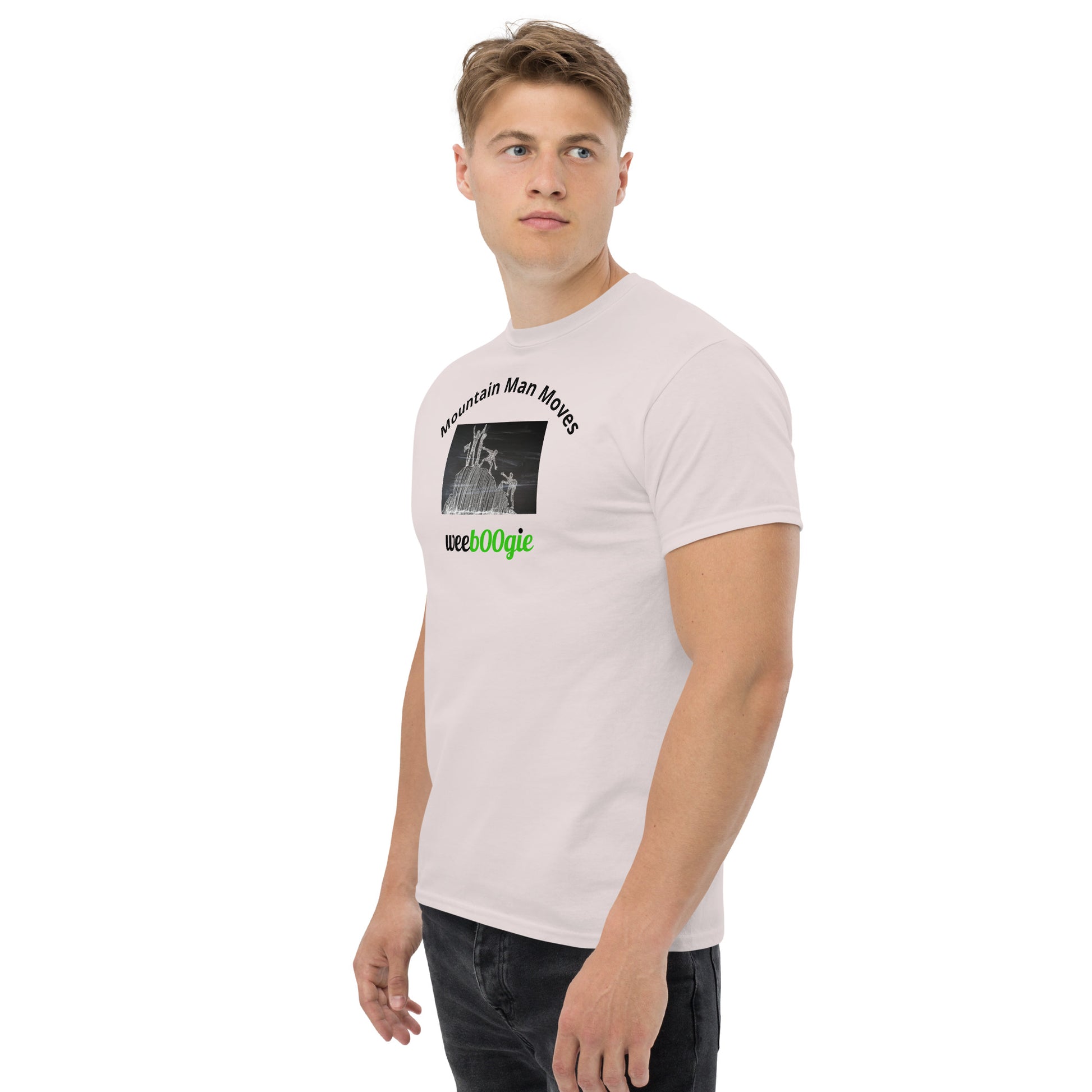 Unisex t-shirt with 'Mountain Man Moves' slogan, styled for outdoor adventures and dance challenges – set against a bold, mountainous backdrop.