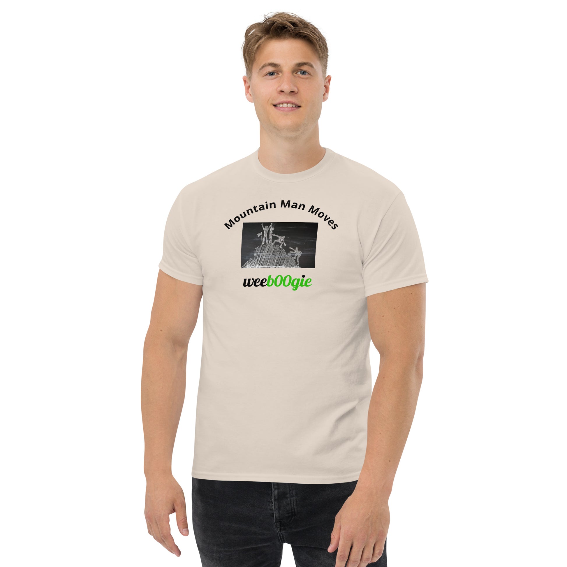 Unisex t-shirt with 'Mountain Man Moves' slogan, styled for outdoor adventures and dance challenges – set against a bold, mountainous backdrop.