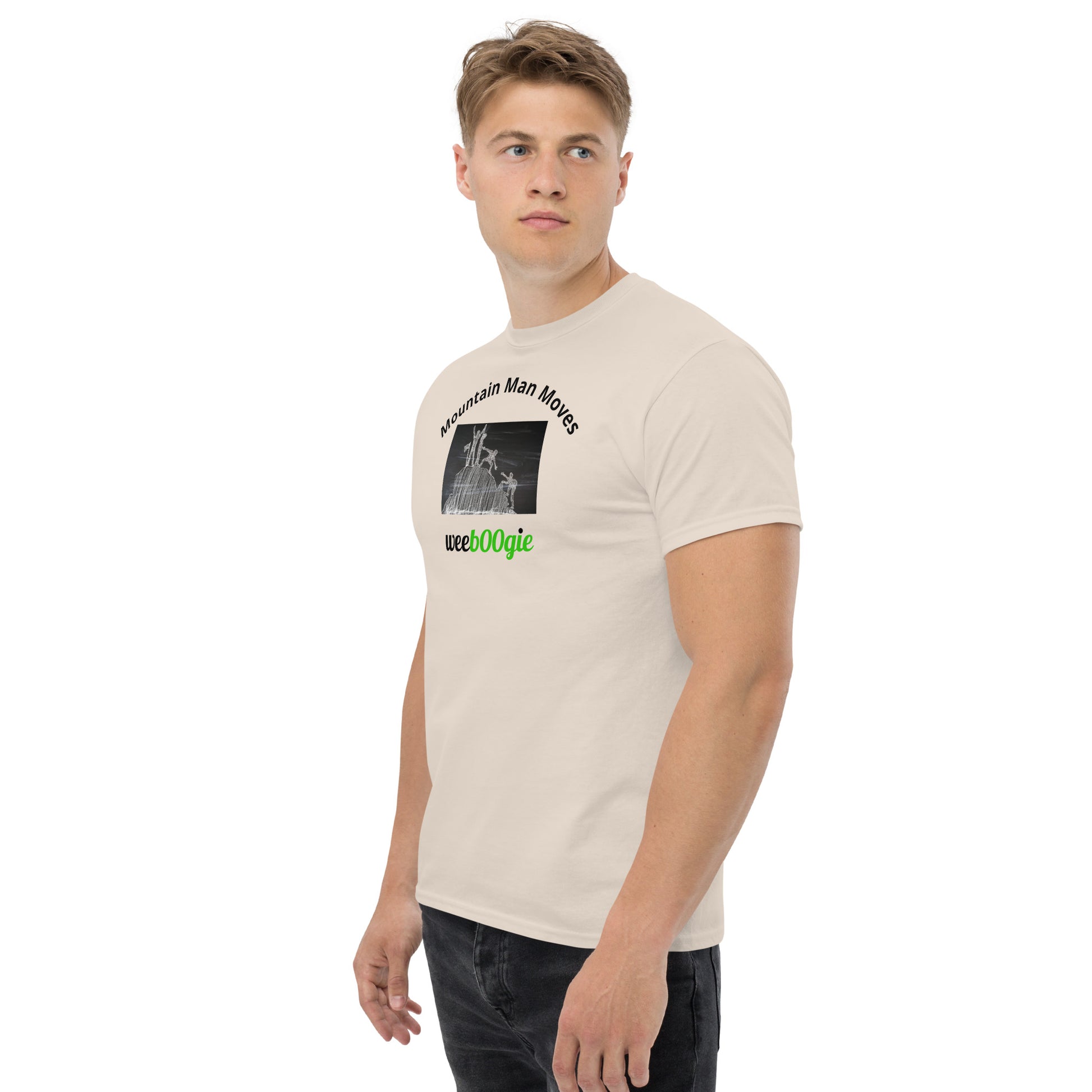 Unisex t-shirt with 'Mountain Man Moves' slogan, styled for outdoor adventures and dance challenges – set against a bold, mountainous backdrop.