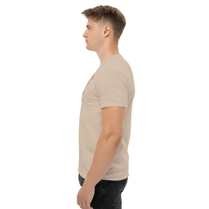 Unisex t-shirt with 'Mountain Man Moves' slogan, styled for outdoor adventures and dance challenges – set against a bold, mountainous backdrop.