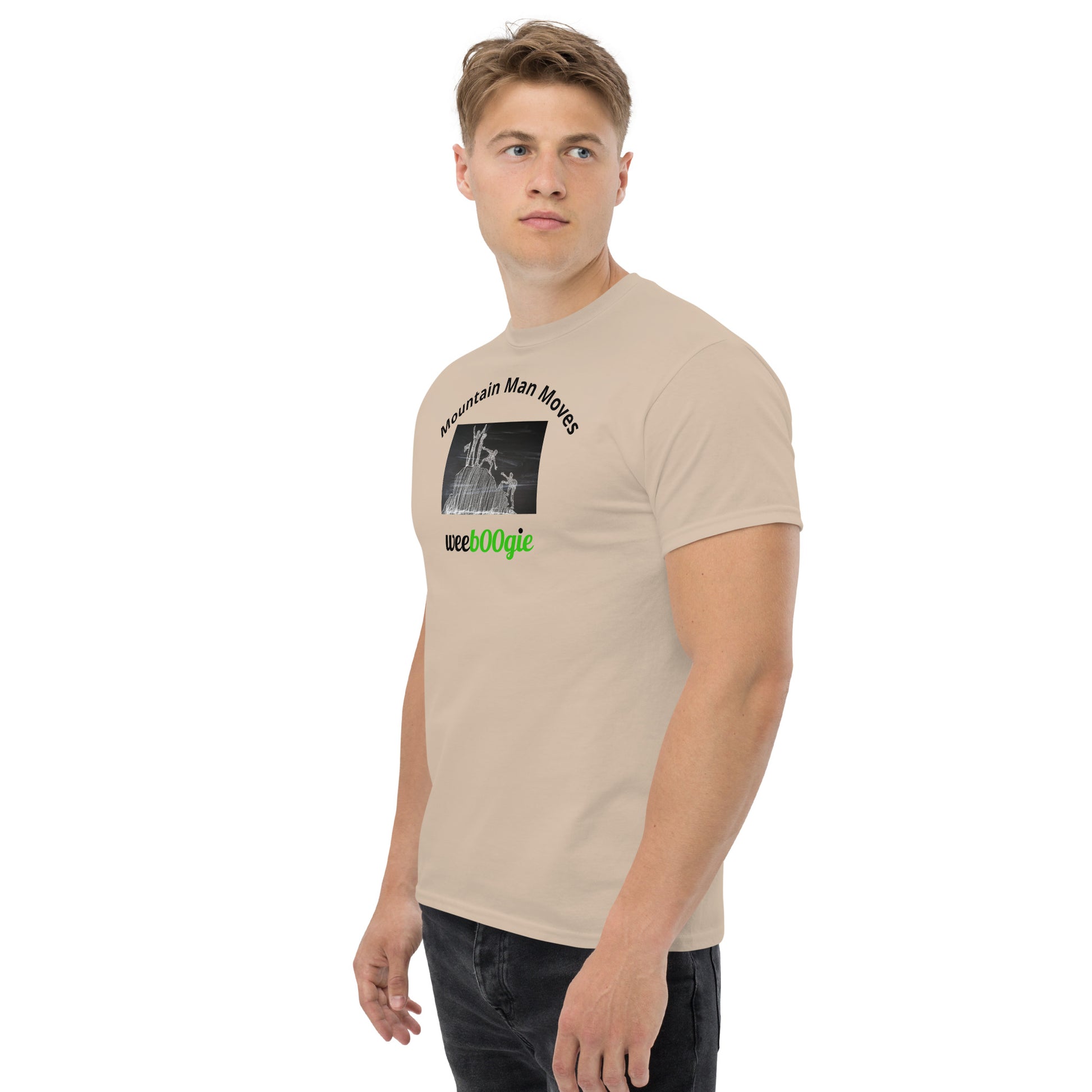 Unisex t-shirt with 'Mountain Man Moves' slogan, styled for outdoor adventures and dance challenges – set against a bold, mountainous backdrop.