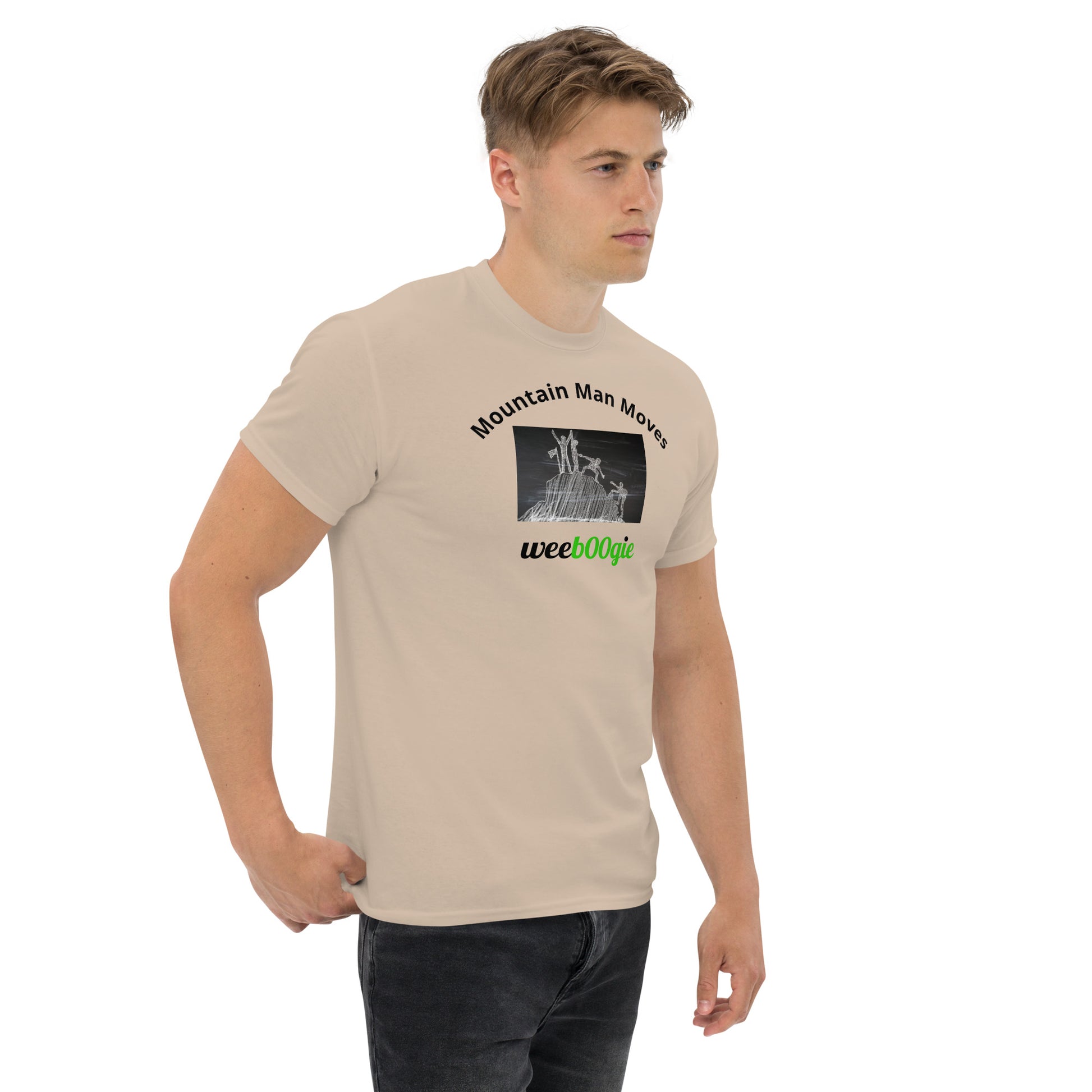 Unisex t-shirt with 'Mountain Man Moves' slogan, styled for outdoor adventures and dance challenges – set against a bold, mountainous backdrop.