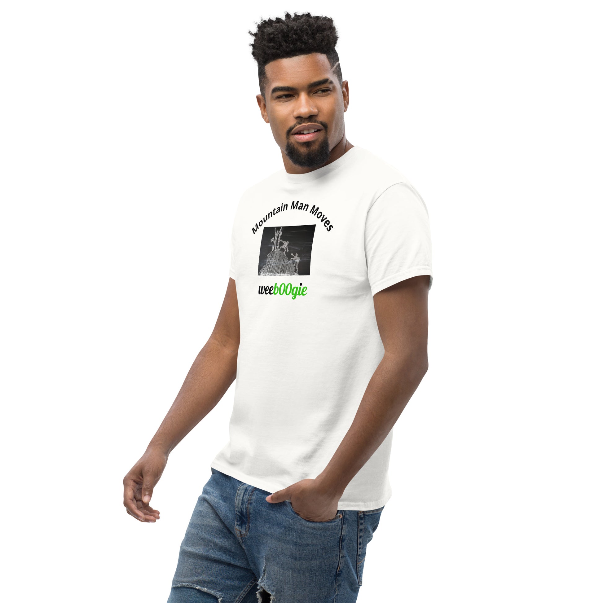 Unisex t-shirt with 'Mountain Man Moves' slogan, styled for outdoor adventures and dance challenges – set against a bold, mountainous backdrop.