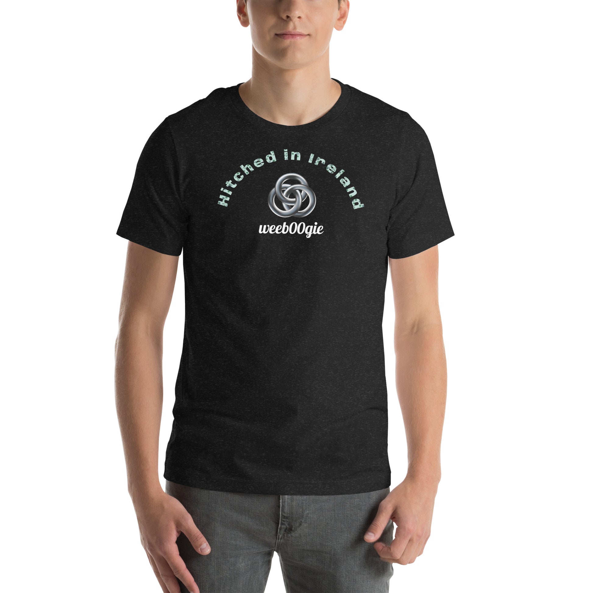 Unisex Staple T-Shirt in Black Heather with 'Hitched in Ireland' Design and wee b00gie Logo - 100% Airlume Combed Ring-Spun Cotton with Side-Seamed Construction - Classic Fit with Shoulder-to-Shoulder Taping - Perfect for Those Just Married in Ireland - Dance Around Our Beautiful Island on Your Honeymoon - wee b00gie store